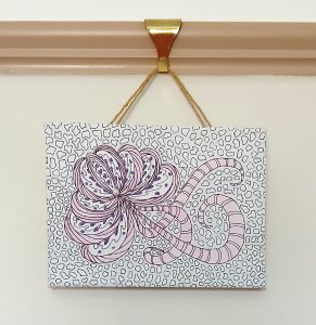 A photograph of a piece of textile art by Zozo Thomas.