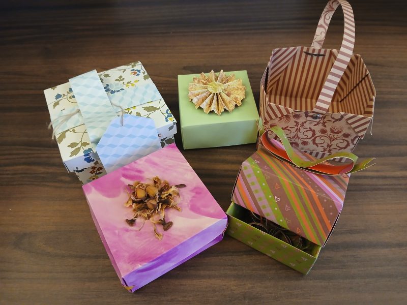 A selection of boxes made from folded paper