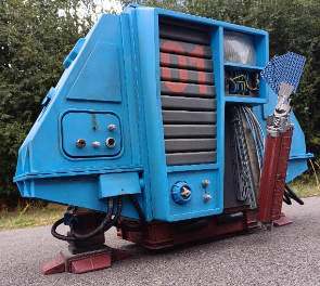 A photograph of a blue robot