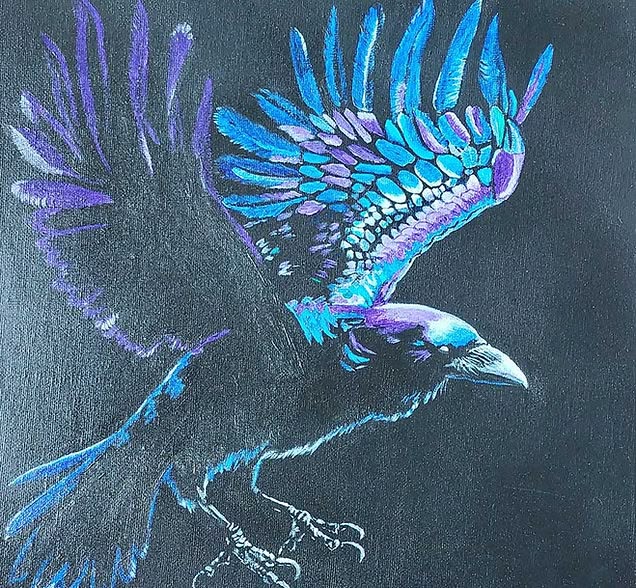 A vibrant, stylised painting of a raven captured mid‑flight against a dark background. The bird’s wings are fully outstretched, with feathers rendered in luminous shades of blue, turquoise, and purple that create a sense of motion and energy. The bright, iridescent colours contrast sharply with the black backdrop, highlighting the raven’s form and giving the artwork a dramatic, mystical feel.